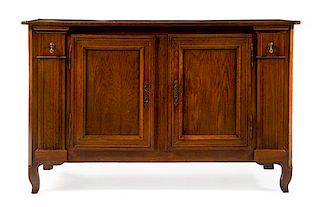 A Louis Philippe Style Oak Cabinet Height 38 1/4 x width 61 3/4 x depth 21 1/2 inches.