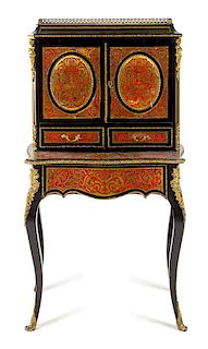A Napoleon III Boulle Marquetry Bonheur du Jour Height 55 x width 30 x depth 19 inches.