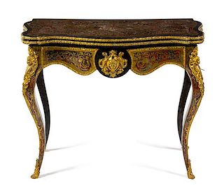 A Napoleon III Boulle Marquetry Flip-Top Table Height 27 1/2 x width 32 x depth 17 inches.