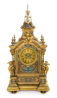 A French Gilt Bronze and Champleve Mantel Clock Height 26 inches.