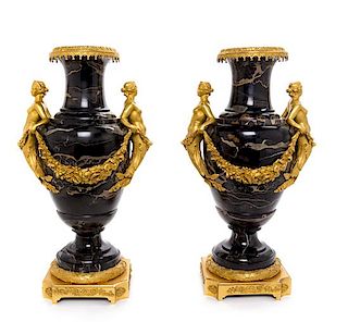 A Pair of French Gilt Bronze Mounted Marble Urns Height 22 1/4 inches.