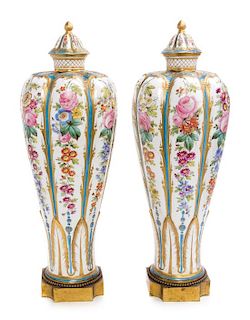 A Pair of Sevres Painted Porcelain Vases Height 19 3/4 inches.