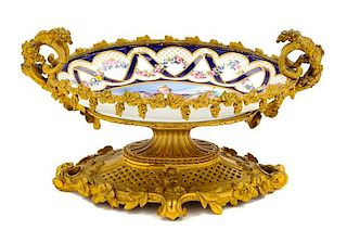 A French Gilt Bronze Mounted Porcelain Center Bowl Height 8 x width 13 3/4 inches.