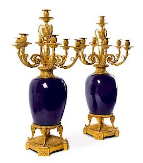 A Pair of Sevres Style Gilt Bronze and Porcelain Seven-Light Candelabra Height 32 inches.