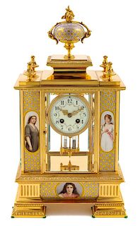 A French Porcelain Mounted Gilt Metal Clock Height 19 1/4 inches.