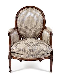 A Northern Italian Walnut Bergere Height 38 1/8 inches.
