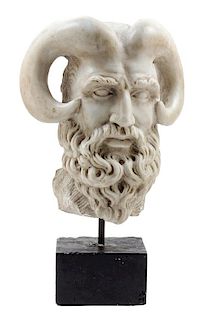 An Italian Marble Bust of a Satyr Height of marble 12 1/2 inches.