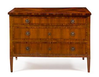 * An Italian Walnut and Marquetry Commode Height 36 7/8 x width 50 1/4 x depth 23 3/8 inches.