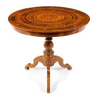A Continental Parquetry Occasional Table Heigh 34 x diameter of top 36 inches.