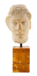 * A Roman Marble Head of a Youthful Male Height 6 1/2 inches.