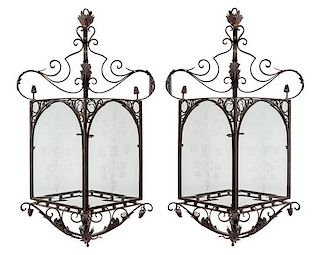 A Pair of Wrought Iron and Etched Glass Lanterns Height 56 inches.