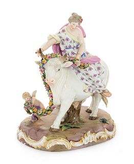 A Meissen Porcelain Figural Group Height 10 1/4 inches.
