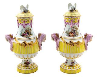 A Pair of German Porcelain Covered Urns Height 22 inches.