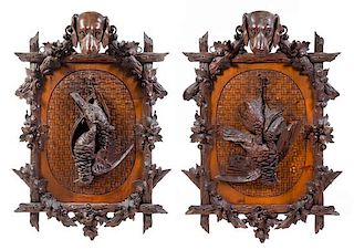 A Pair of Black Forest Carved Game Plaques Height 38 x width 26 inches.