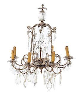 * A Continental Gilt Metal and Glass Chandelier Height 31 1/2 x diameter 25 inches.