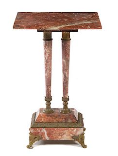 * A Continental Gilt Bronze Mounted Marble Pedestal Height 30 1/2 x width 19 3/4 x depth 13 3/4 inches.