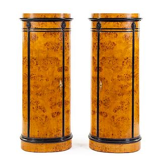A Pair of Danish Parcel Ebonized Cabinets Height 58 1/2 x width 25 x depth 16 1/4 inches.