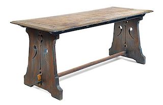 A Swedish Painted Trestle Table Height 32 x width 77 1/2 x depth 31 1/2 inches.