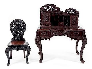 * A Japanese Carved Desk and Side Chair Height of desk 52 1/2 x width 45 1/2 x depth 26 1/4 inches.