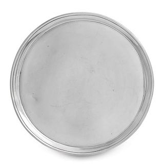 A George III Silver Salver, Robert Sharp, London, 1790, of circular form with a reeded rim, raised on three tapering feet worked