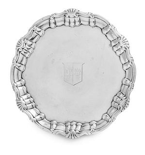 A Victorian Silver Salver, Edward Ker Reid, London, 1871, of circular form, the undulating rim worked to show C-scrolls and roca