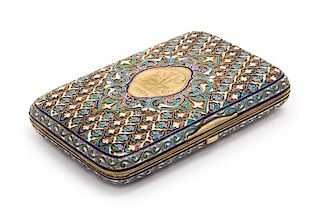 A Russian Enameled Silver Cigarette Case, Mark of Nikolai Nemirov-Kolodkin, Moscow, 1896, the case exterior worked thoughout wit