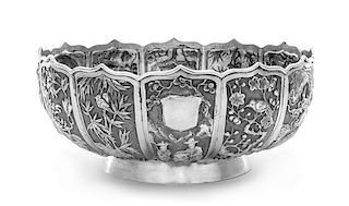 * A Chinese Export Silver Bowl, Woshing, Shanghai, Late 19th/Early 20th Centurty, the exterior worked to show panels of garden s