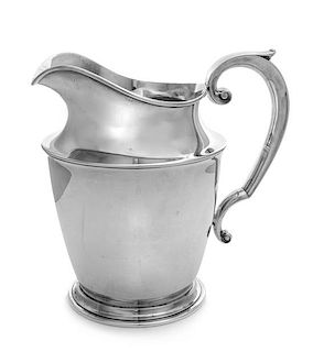 An American Silver Water Pitcher, Watson Co., Attleboro, MA, 20th Century, with an S-scroll handle.