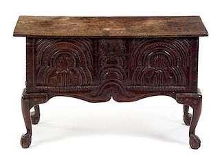 An English Baroque Oak Coffer Height 23 1/2 x width 37 1/2 x depth 13 1/4 inches.