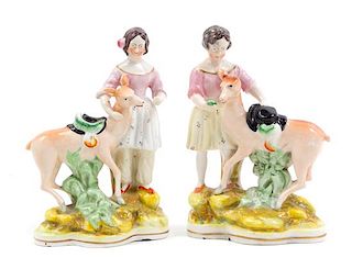 A Pair of Staffordshire Figural Groups Height 7 inches.