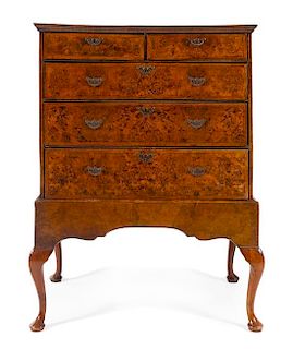 A Queen Anne Burlwood Chest on Stand Height 52 1/4 x width 39 x depth 22 1/2 inches.