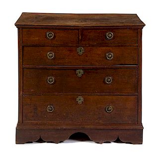 A George III Oak Chest of Drawers Height 35 1/2 x width 37 5/8 x depth 21 1/2 inches.