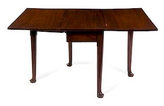 A Queen Anne Style Mahogany Drop-Leaf Table Height 28 x width 40 x depth 18 1/2 inches.