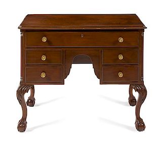 A George II Style Mahogany Lowboy Height 31 x width 37 x depth 19 1/2 inches.