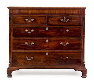 A George III Mahogany Chest of Drawers Height 47 x width 52 x depth 21 3/4 inches.