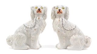 A Pair of Staffordshire Spaniels Height 11 inches.