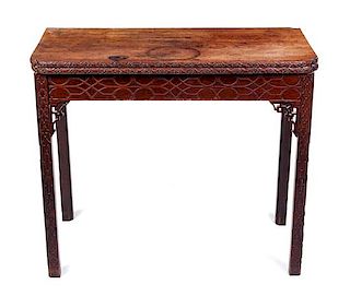 A George III Mahogany Flip-Top Table Height 29 x width 34 x depth 17 inches.