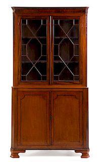 A George III Mahogany Corner Cabinet Height 81 1/2 x width 43 x depth 23 inches.