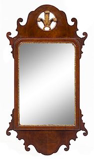 A George III Parcel Gilt Mahogany Tablet Mirror Height 31 x width 16 3/4 inches.