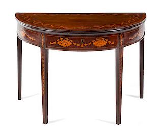 * A George III Mahogany and Marquetry Flip-Top Table Height 28 5/8 x width 42 1/8 x depth 23 7/8 inches (closed).