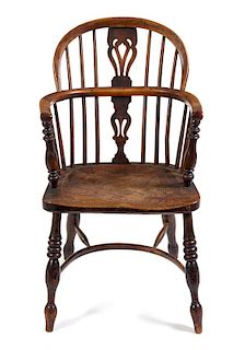An English Oak Windsor Armchair Height 34 1/2 inches.