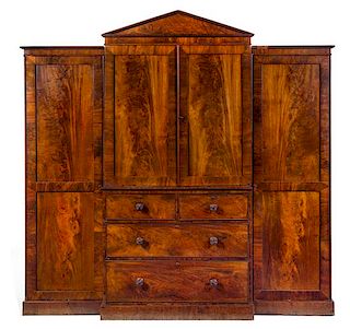 A Regency Mahogany Breakfront Cabinet Height 77 3/4 x width 83 7/8 x depth 21 5/8 inches.