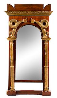 A Regency Parcel Gilt Rosewood and Mahogany Pier Mirror Height 70 x width 34 inches.