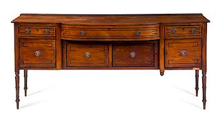 A Regency Style Mahogany Sideboard Height 34 1/2 x width 77 1/4 x depth 22 inches.