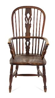 An English Oak Windsor Armchair Height 41 3/4 inches.