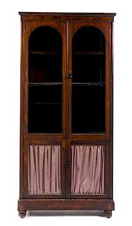 A Victorian Rosewood Bookcase Height 81 3/4 x width 38 1/2 x depth 13 3/4 inches.