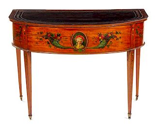 An Edwardian Painted Satinwood Writing Table Height 31 x width 42 1/2 x depth 24 inches.