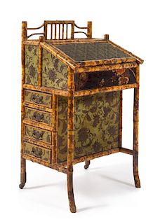 A Victorian Bamboo and Lacquer Davenport Desk Height 40 1/2 x width 23 x depth 19 1/2 inches.