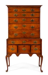 A Queen Anne Maple Highboy Height 70 x width 40 x depth 22 inches.
