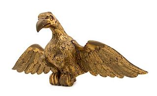 A Carved Giltwood Eagle Ornament Height 12 1/2 x width 29 1/2 inches.